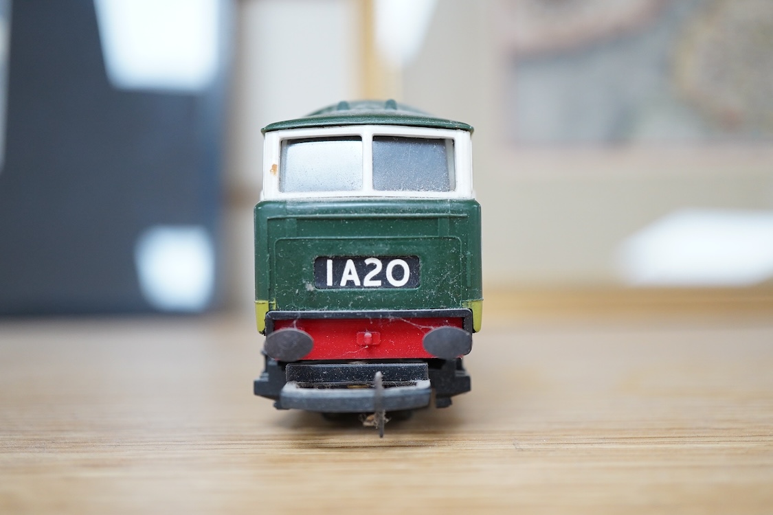 A quantity of 00 gauge railway by various makes, comprising; nine locomotives by Tri-ang, Hornby Dublo, etc. (one missing tender), sixteen maroon bogie coaches and eighteen freight wagons